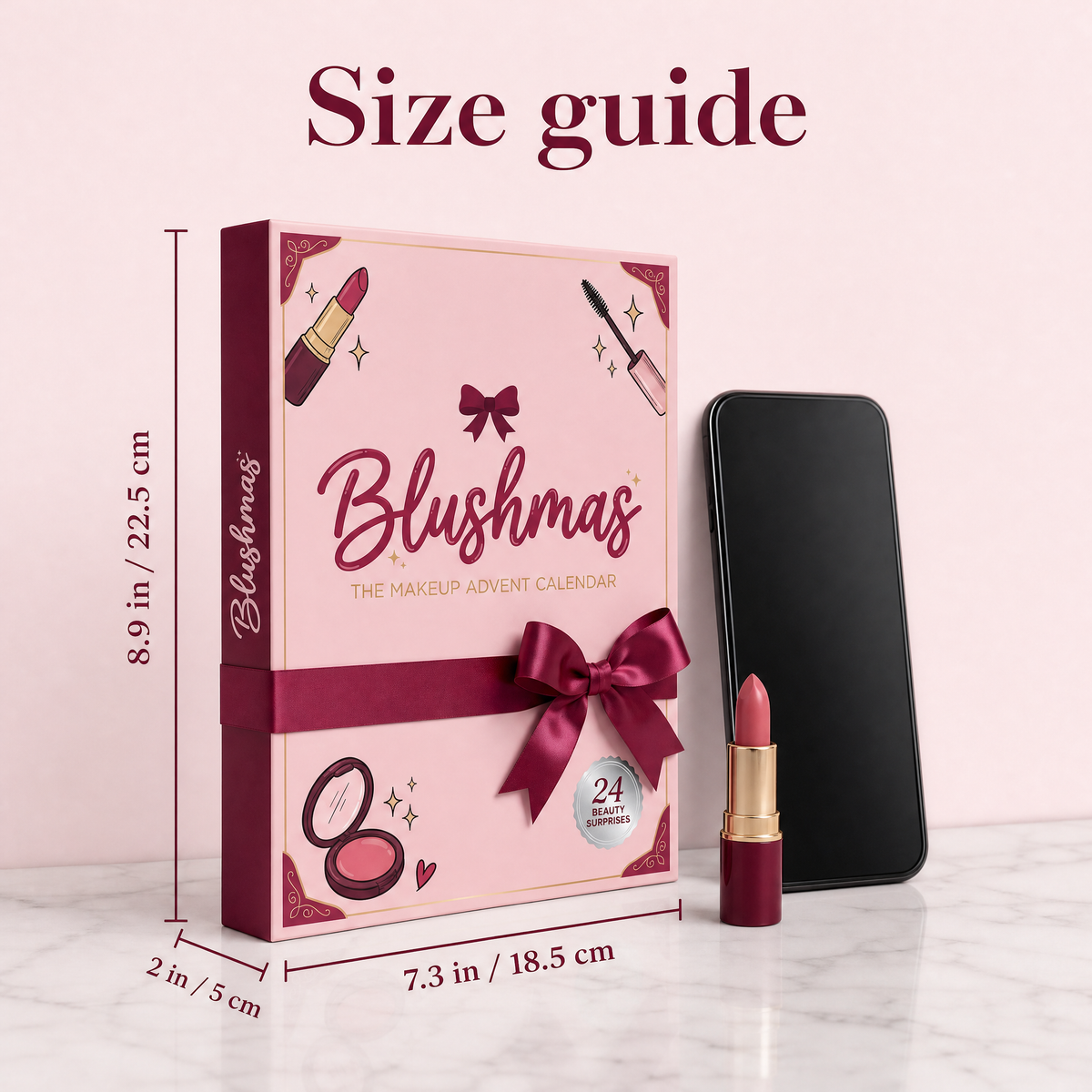 Blushmas advent calendar size guide: 7.3 x 8.9 x 2 in (18.5 x 22.5 x 5 cm), shown next to a smartphone and a lipstick for scale
